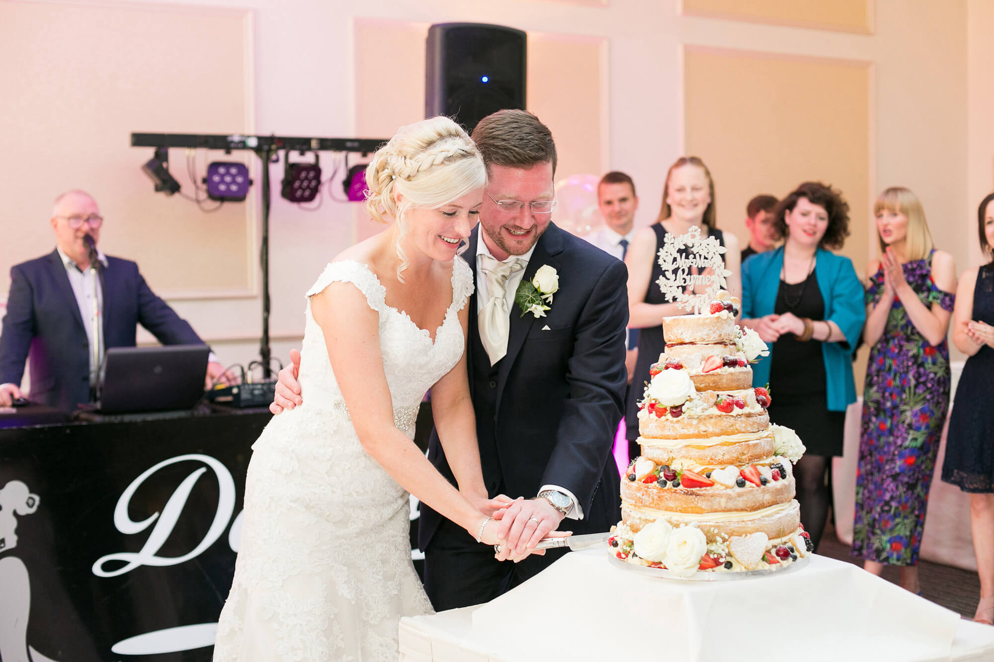 colour photo couple cutting cake